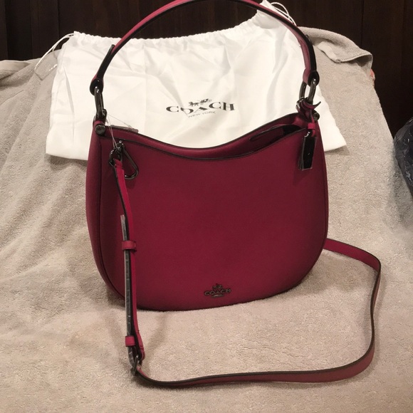 Coach Handbags - Coach Brand new pink handbag with a modern look
